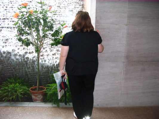 Carolyn in the souvenir store's fountain.jpg